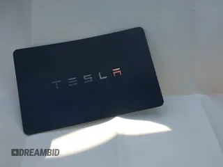 2024 Tesla Model Y Long Range z VIN 7SAYGDEEXRA263444, wystawiony jako IAAI lot #40199252 z przebiegiem 9 540 mil mil oraz . Historia ofert i sprzedaży dostępna na DreamBid. Obrazek 11.
