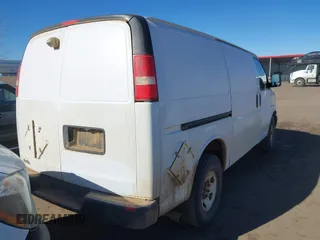 2014 Chevrolet Express Cargo Van with VIN 1GCWGFCAXE1205405, listed as a IAAI auction lot 41700218 with 397,332 mi miles. Bid and sale history available at carsss.com. Image 4.