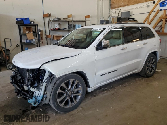 2017 Jeep Grand Cherokee Overland z VIN 1C4RJFCG8HC809868, wystawiony jako Copart lot #64056155 z przebiegiem 54 136 mil mil oraz Szkoda całkowita • Salvage title. Historia ofert i sprzedaży dostępna na DreamBid. Obrazek 1.