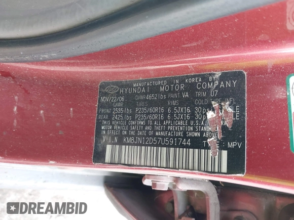 2007 Hyundai Tucson SE with VIN KM8JN12D57U591744, listed as a IAAI auction lot 41511882 with 259,397 mi miles. Bid and sale history available at carsss.com. Image 9.
