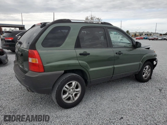 2005 Kia Sportage LX with VIN KNDJF723657074234, listed as a Copart auction lot 86792794 with 97,548 mi miles and Salvage Title. Bid and sale history available at carsss.com. Image 3.