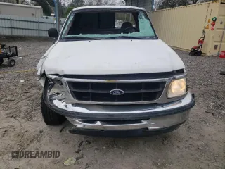 1997 Ford F-150 with VIN 1FTDF1764VKA00255, listed as a Copart auction lot 48778815 with 272,332 mi miles and Salvage title. Bid and sale history available at DreamBid. Image 5.