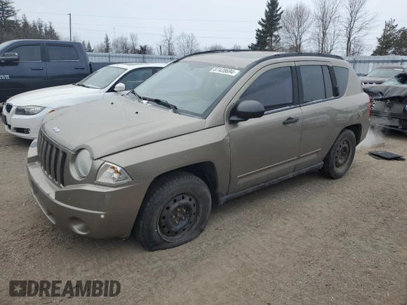 2008 Jeep Compass Sport with VIN 1J8FT47WX8D566487, listed as a Copart auction lot 87428694 with 377,985 mi miles and Salvage Title. Bid and sale history available at carsss.com. Image 1.