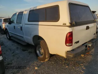 2000 Ford F-350 XL with VIN 1FTSW30S6YEC82315, listed as a Copart auction lot 75479334 with 327,345 mi miles and Salvage Title. Bid and sale history available at DreamBid. Image 2.