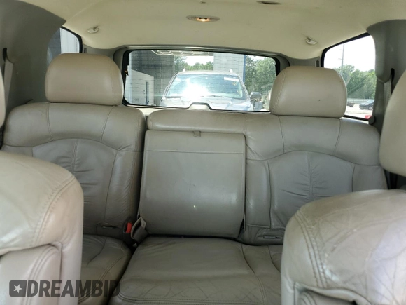 2002 Chevrolet Tahoe LT with VIN 1GNEC13Z92J335338, listed as a Copart auction lot 56715805 with 332,986 mi miles and Salvage title. Bid and sale history available at DreamBid. Image 10.