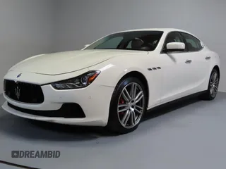 2014 Maserati Ghibli S Q4 z VIN ZAM57RTA7E1094580, wystawiony jako Copart lot #52009445 z przebiegiem 79 463 mil mil oraz Szkoda całkowita • Salvage title. Historia ofert i sprzedaży dostępna na DreamBid. Obrazek 2.