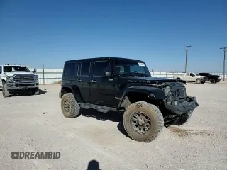 2012 Jeep Wrangler Unlimited Rubicon z VIN 1C4HJWFG9CL105047, wystawiony jako Copart lot #49494005 z przebiegiem 132 591 mil mil oraz Szkoda całkowita • Salvage title. Historia ofert i sprzedaży dostępna na DreamBid. Obrazek 11.