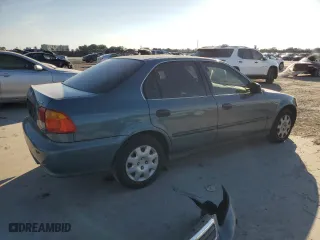 1999 Honda Civic DX with VIN 1HGEJ6629XL031952, listed as a Copart auction lot 41691105 with 66,909 mi miles and Salvage Title. Bid and sale history available at carsss.com. Image 3.