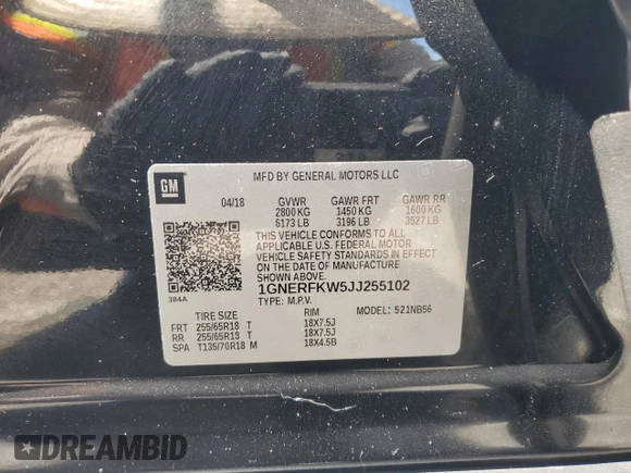 2018 Chevrolet Traverse LS z VIN 1GNERFKW5JJ255102, wystawiony jako Copart lot #56252255 z przebiegiem 82 385 mil mil oraz Szkoda całkowita • Salvage title. Historia ofert i sprzedaży dostępna na DreamBid. Obrazek 13.