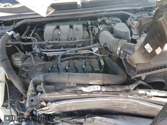 2015 Ford Taurus SEL z VIN 1FAHP2E86FG203425, wystawiony jako Copart lot #52261295 z przebiegiem 78 575 mil mil oraz Szkoda całkowita • Salvage title. Historia ofert i sprzedaży dostępna na DreamBid. Obrazek 11.