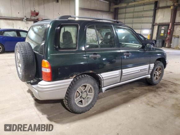 2002 Chevrolet Tracker LT z VIN 2CNBJ634126949974, wystawiony jako Copart lot #54819695 z przebiegiem 200 895 mil mil oraz Szkoda całkowita • Salvage title. Historia ofert i sprzedaży dostępna na DreamBid. Obrazek 3.
