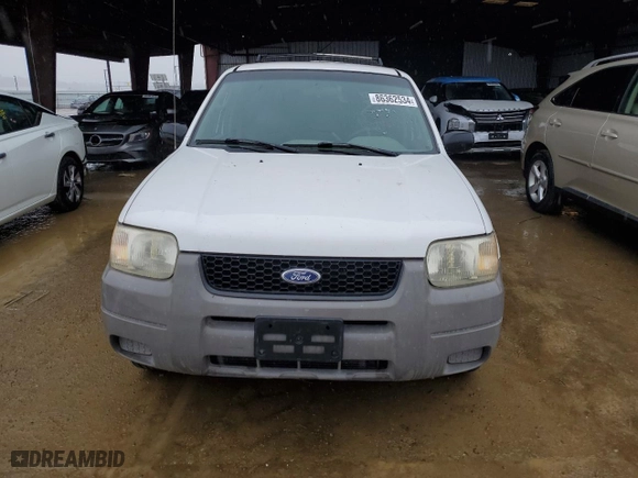 2001 Ford Escape XLS with VIN 1FMYU01191KA29996, listed as a Copart auction lot 86362534 with 265,271 mi miles and Salvage Title. Bid and sale history available at carsss.com. Image 5.