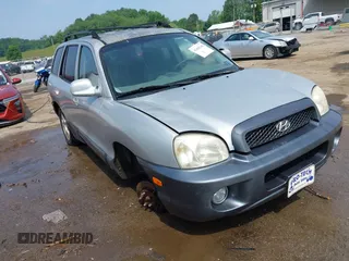 2003 Hyundai Santa Fe GLS z VIN KM8SC73D63U535320, wystawiony jako IAAI lot #42482140 z przebiegiem Nie podano mil oraz . Historia ofert i sprzedaży dostępna na DreamBid. Obrazek 1.