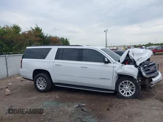 2019 GMC Yukon XL SLT with VIN 1GKS2GKC2KR369285, listed as a IAAI auction lot 40279008 with Not Provided miles and . Bid and sale history available at DreamBid. Image 13.