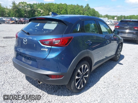 2019 Mazda CX-3 Touring z VIN JM1DKFC72K1459583, wystawiony jako IAAI lot #42380694 z przebiegiem 13 846 mil mil oraz . Historia ofert i sprzedaży dostępna na DreamBid. Obrazek 4.