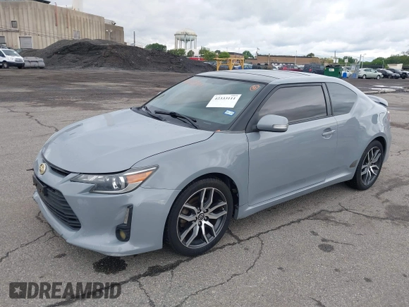2014 Scion tC z VIN JTKJF5C71E3081033, wystawiony jako IAAI lot #42333111 z przebiegiem 144 124 mil mil oraz . Historia ofert i sprzedaży dostępna na DreamBid. Obrazek 17.