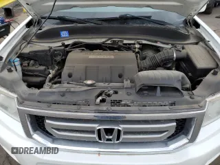 2010 Honda Ridgeline RTL with VIN 5FPYK1F58AB005088, listed as a Copart auction lot 47477975 with 128,538 mi miles and Salvage Title. Bid and sale history available at carsss.com. Image 12.