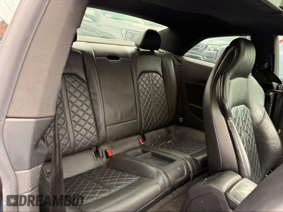 2018 Audi S5 Premium Plus with VIN WAUP4AF59JA077177, listed as a IAAI auction lot 42218794 with 86,654 mi miles and . Bid and sale history available at DreamBid. Image 8.