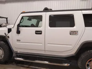 2006 Hummer H2 with VIN 5GRGN23U06H121985, listed as a IAAI auction lot 41336620 with 171,647 mi miles. Bid and sale history available at carsss.com. Image 15.
