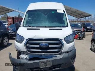 2020 Ford Transit Cargo z VIN 1FTBW3X89LKB72069, wystawiony jako IAAI lot #42623407 z przebiegiem 454 279 mil mil oraz . Historia ofert i sprzedaży dostępna na DreamBid. Obrazek 13.