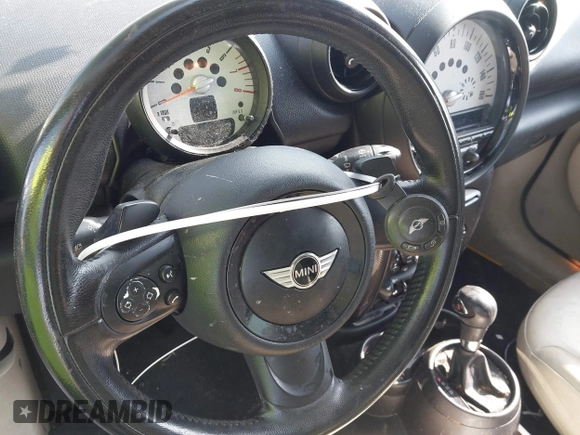 2013 MINI Countryman S z VIN WMWZC3C59DWP22638, wystawiony jako IAAI lot #42327540 z przebiegiem 155 060 mil mil oraz . Historia ofert i sprzedaży dostępna na DreamBid. Obrazek 11.