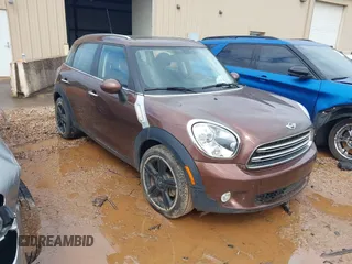 2016 MINI Countryman z VIN WMWZB3C50GWR47537, wystawiony jako IAAI lot #42242795 z przebiegiem 46 960 mil mil oraz . Historia ofert i sprzedaży dostępna na DreamBid. Obrazek 1.