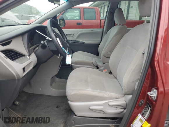2015 Toyota Sienna L with VIN 5TDZK3DC5FS634370, listed as a Copart auction lot 63488005 with 115,815 mi miles and Salvage title. Bid and sale history available at DreamBid. Image 7.