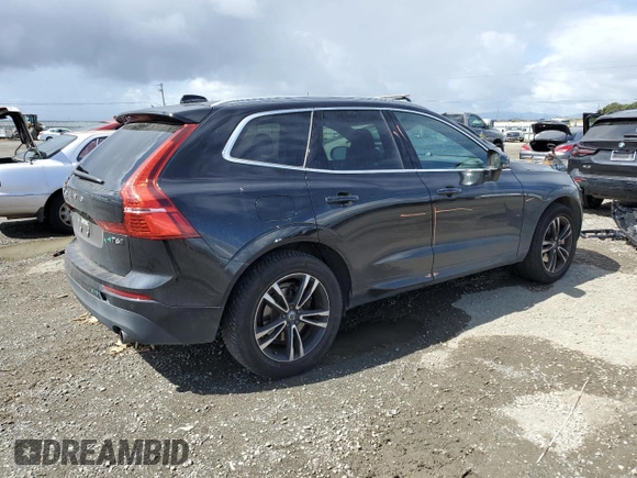 2018 Volvo XC60 Momentum z VIN LYVA22RK2JB078752, wystawiony jako Copart lot #56593385 z przebiegiem 50 890 mil mil oraz Szkoda całkowita • Salvage title. Historia ofert i sprzedaży dostępna na DreamBid. Obrazek 3.