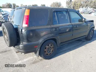 2001 Honda CR-V LX with VIN JHLRD28461S000740, listed as a IAAI auction lot 42078040 with 200,466 mi miles. Bid and sale history available at carsss.com. Image 4.