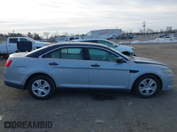 2014 Ford Police Interceptor with VIN 1FAHP2MK6EG153699, listed as a IAAI auction lot 41397473 with 174,452 mi miles and . Bid and sale history available at DreamBid. Image 13.