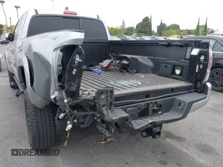 2022 Toyota Tacoma SR with VIN 3TYRZ5CN9NT022492, listed as a IAAI auction lot 42378801 with 9,312 mi miles and . Bid and sale history available at DreamBid. Image 6.