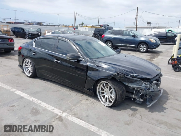 2014 Infiniti Q50 Premium z VIN JN1BV7AP3EM690571, wystawiony jako IAAI lot #42136354 z przebiegiem 191 969 mil mil oraz . Historia ofert i sprzedaży dostępna na DreamBid. Obrazek 1.