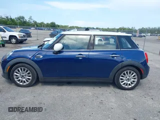 2015 MINI Hardtop 4 Door with VIN WMWXS5C51FT827510, listed as a IAAI auction lot 42365599 with 53,667 mi miles and . Bid and sale history available at DreamBid. Image 14.