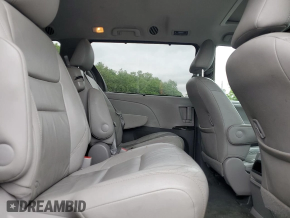 2015 Toyota Sienna XLE with VIN 5TDYK3DC4FS659692, listed as a Copart auction lot 57248355 with 121,644 mi miles and Salvage title. Bid and sale history available at DreamBid. Image 11.