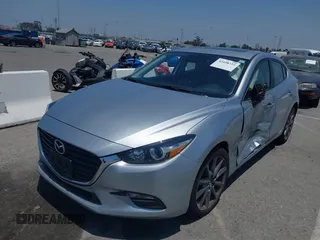 2018 Mazda 3 Touring z VIN 3MZBN1V35JM272638, wystawiony jako IAAI lot #42458722 z przebiegiem 98 393 mil mil oraz . Historia ofert i sprzedaży dostępna na DreamBid. Obrazek 17.