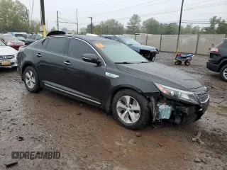 2015 Kia Optima Hybrid with VIN KNAGM4AD0F5082638, listed as a Copart auction lot 72855864 with 0 mi miles and Salvage Title. Bid and sale history available at carsss.com. Image 4.