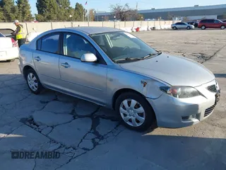 2007 Mazda Mazda3 i Sport with VIN JM1BK12F371721573, listed as a IAAI auction lot 41776548 with 152,317 mi miles. Bid and sale history available at carsss.com. Image 1.