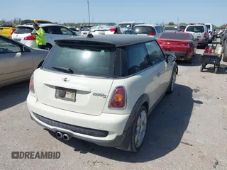 2007 MINI Hardtop S with VIN WMWMF73527TT82098, listed as a IAAI auction lot 41828664 with 107,418 mi miles and . Bid and sale history available at DreamBid. Image 4.