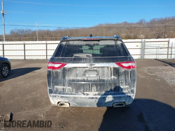 2018 Chevrolet Traverse Premier z VIN 1GNEVJKW5JJ174261, wystawiony jako IAAI lot #41656906 z przebiegiem 101 908 mil mil oraz . Historia ofert i sprzedaży dostępna na DreamBid. Obrazek 16.