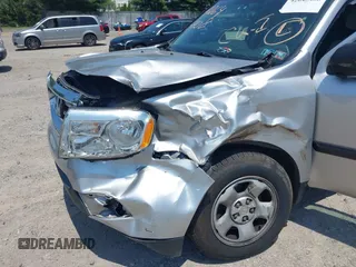 2014 Honda Pilot LX with VIN 5FNYF4H22EB024677, listed as a IAAI auction lot 42645408 with 133,271 mi miles and . Bid and sale history available at DreamBid. Image 6.