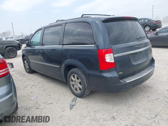 2013 Chrysler Town & Country Touring with VIN 2C4RC1BG4DR595154, listed as a IAAI auction lot 42077785 with 169,474 mi miles. Bid and sale history available at carsss.com. Image 3.