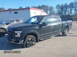 2015 Ford F-150 XLT with VIN 1FTEW1E86FFC00959, listed as a IAAI auction lot 41581711 with 130,298 mi miles. Bid and sale history available at carsss.com. Image 2.