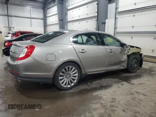2016 Lincoln MKS с VIN 1LNHL9DK3GG600907, выставлен на аукционе Copart как лот 56892995 с пробегом 122 220 миль миль и Списание • Salvage title. История ставок и продаж доступна на DreamBid. Изображение 3.