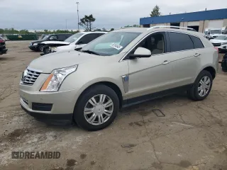 2015 Cadillac SRX Luxury Collection z VIN 3GYFNBE39FS616558, wystawiony jako Copart lot #58184645 z przebiegiem 144 642 mil mil oraz Tytuł czysty. Historia ofert i sprzedaży dostępna na DreamBid. Obrazek 1.