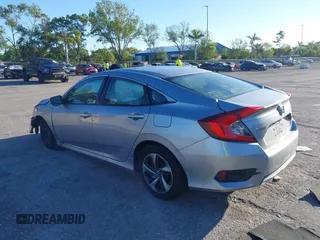 2020 Honda Civic LX with VIN 19XFC2F63LE004953, listed as a IAAI auction lot 41824922 with 71,458 mi miles and . Bid and sale history available at DreamBid. Image 3.
