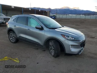 2021 Ford Escape Titanium with VIN 1FMCU9J97MUA70995, listed as a Copart auction lot 87004884 with Not Provided miles and Salvage Title. Bid and sale history available at carsss.com. Image 4.