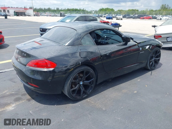 2013 BMW Z4 sDrive28i with VIN WBALL5C54DJ103959, listed as a IAAI auction lot 42371850 with 100,953 mi miles and . Bid and sale history available at DreamBid. Image 4.