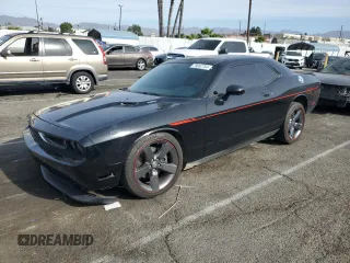 2013 Dodge Challenger R/T Classic z VIN 2C3CDYBT8DH729215, wystawiony jako Copart lot #79692754 z przebiegiem 74 570 mil mil oraz Szkoda całkowita • Salvage title. Historia ofert i sprzedaży dostępna na DreamBid. Obrazek 1.