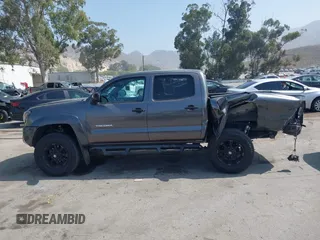 2013 Toyota Tacoma PreRunner z VIN 5TFJX4GN2DX018800, wystawiony jako IAAI lot #42304447 z przebiegiem 188 409 mil mil oraz . Historia ofert i sprzedaży dostępna na DreamBid. Obrazek 14.