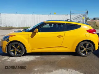 2013 Hyundai Veloster w/Gray Int with VIN KMHTC6AD8DU093272, listed as a IAAI auction lot 40407768 with 91,038 mi miles and . Bid and sale history available at DreamBid. Image 14.